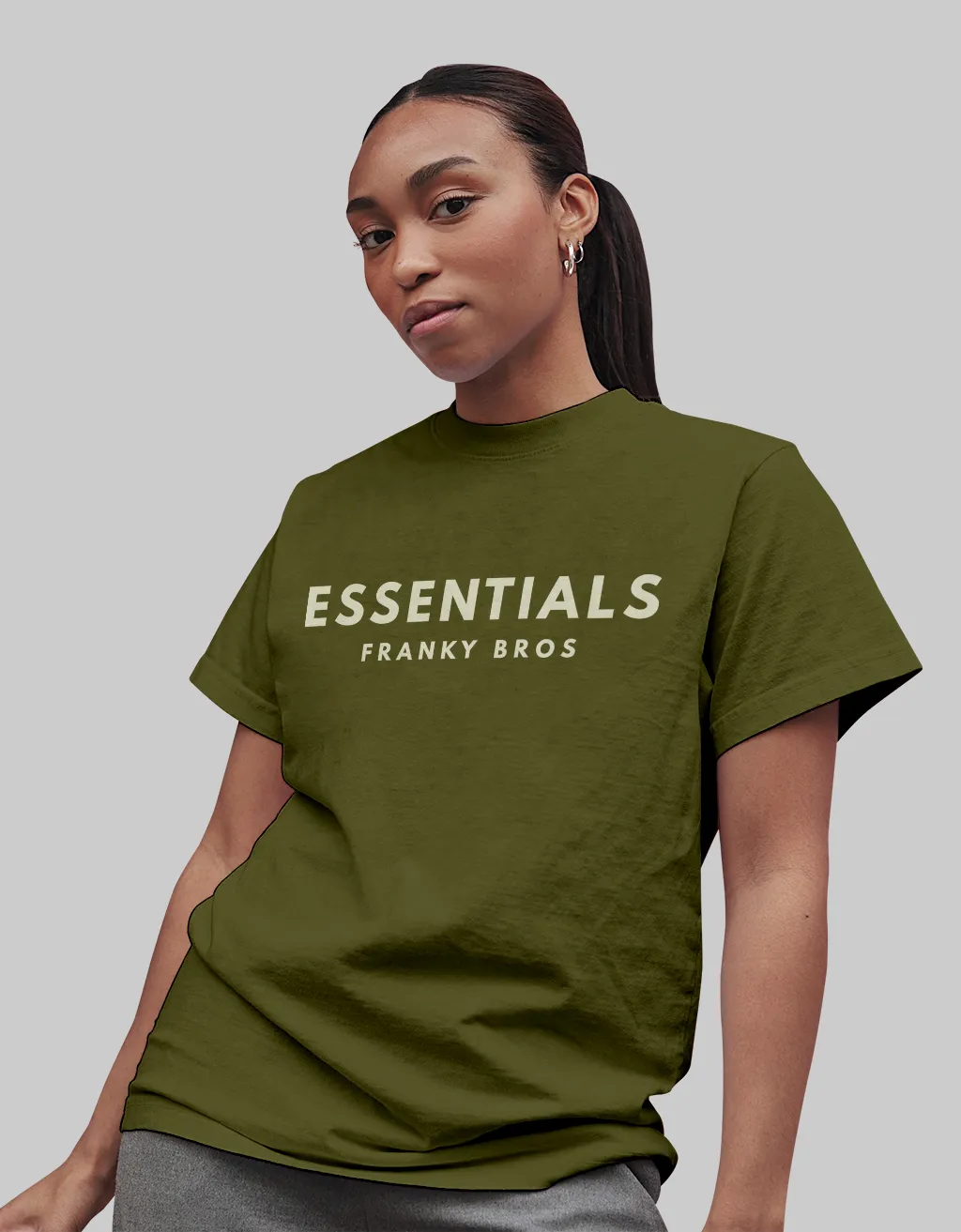 https://frankybros.com/wp-content/uploads/2022/10/essentials-t-shirt-olive-green-t-shirt-for-women-and-men-online-india.webp